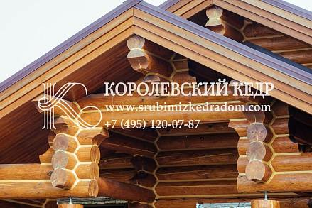 Деревянный дом из оцилиндрованного бревна 